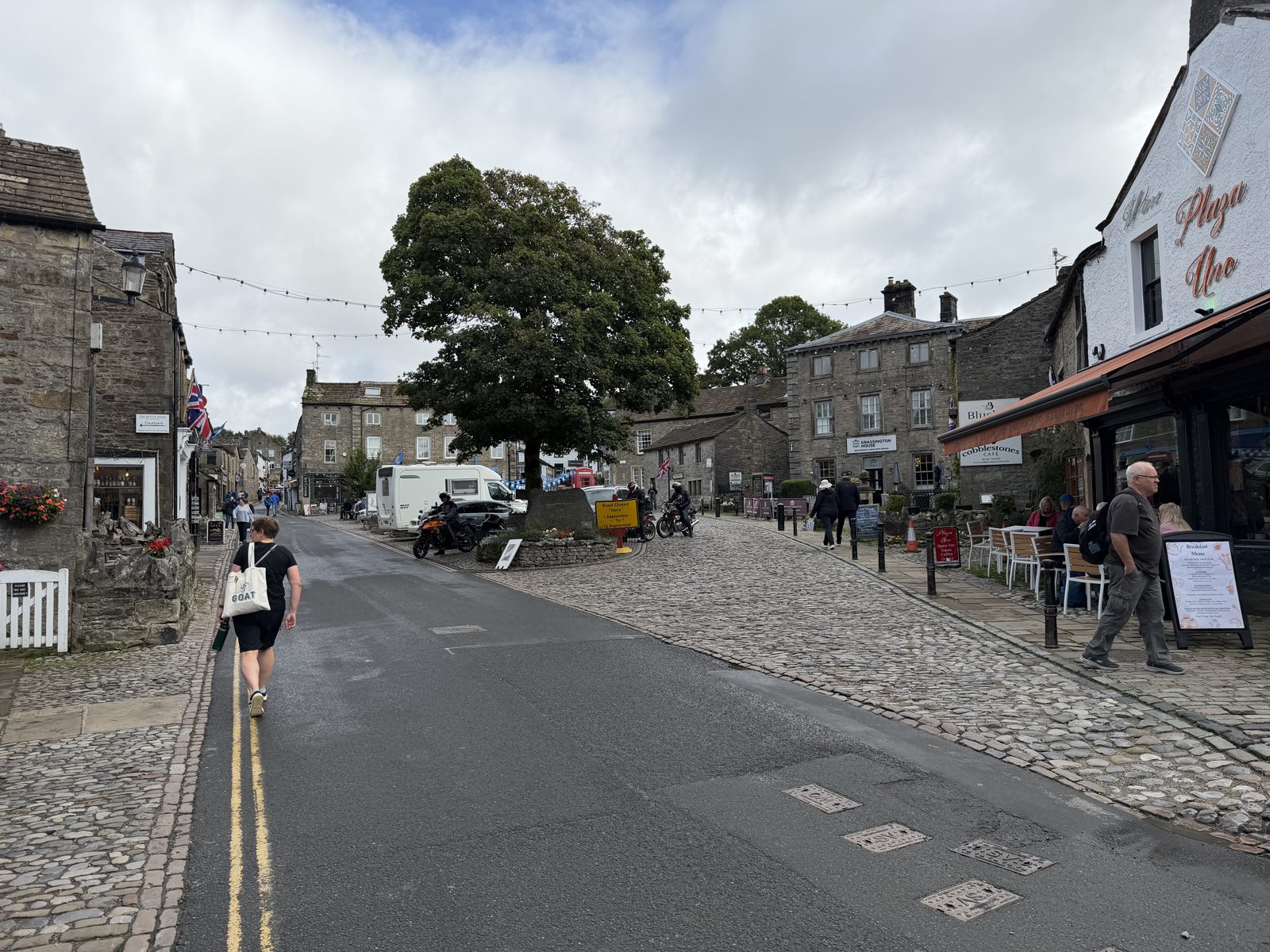 Grassington's cobbled main street with bunting up