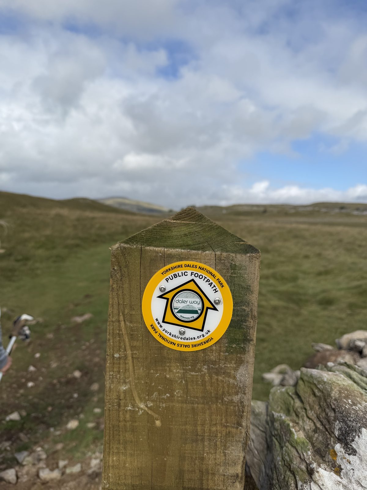 The Dales Way waymark post on the open moor